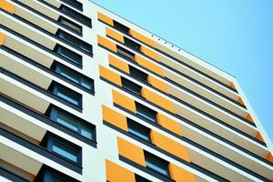 Cityscape with facade of a modern residential building. Modern European residential apartment building. photo