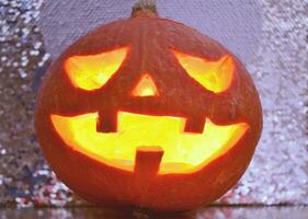 Halloween pumpkin lantern with dark background photo