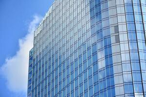 Fragment of glass and metal facade walls. Commercial office buildings. Abstract modern business architecture. photo