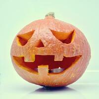 Halloween pumpkin lantern with dark background photo