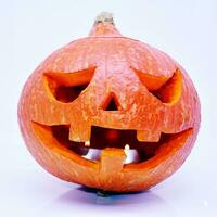 Halloween pumpkin lantern with dark background photo