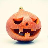 Halloween pumpkin lantern with dark background photo