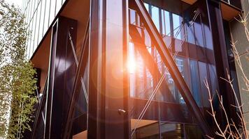 Combination of metal and glass wall material. Steel facade on columns. Abstract modern architecture. High-tech minimalist office building. Contemporary business architecture abstract fragment. photo