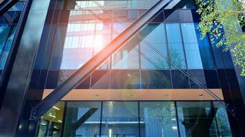 Combination of metal and glass wall material. Steel facade on columns. Abstract modern architecture. High-tech minimalist office building. Contemporary business architecture abstract fragment. photo