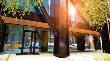 Combination of metal and glass wall material. Steel facade on columns. Abstract modern architecture. High-tech minimalist office building. Contemporary business architecture abstract fragment. photo
