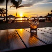 vaso de aperol rociar cóctel en de madera mesa con puesta de sol difuminar playa antecedentes ai generativo foto