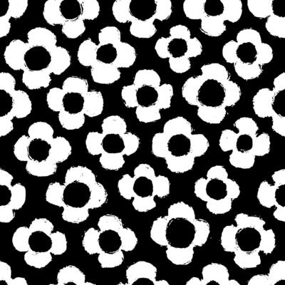 White naive playful daisy seamless pattern on black. Messy graffiti sketch wallpaper print in doodle grunge style. Swiss design aesthetic