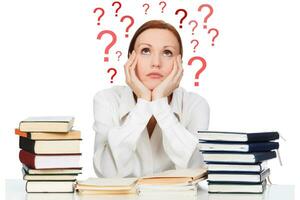 Woman with books against white background photo