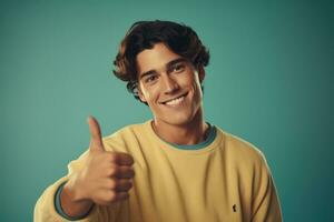 Young handsome smiling guy showing thumbs up in a yellow jacket on a isolated background. AI generative photo