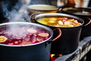 Beverages fruits and berries hot mulled wine in pots with steam in street food market. Generative AI photo