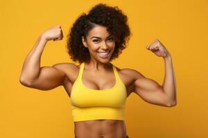 Excited female bodybuilder, fists up on yellow background. Generative AI photo