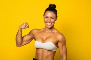 Excited female bodybuilder, fists up on yellow background. Generative AI photo