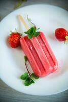 cooked homemade strawberry ice cream on a stick photo