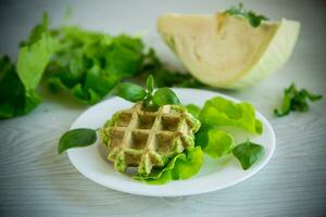 vegetable waffles cooked with herbs in a plate photo