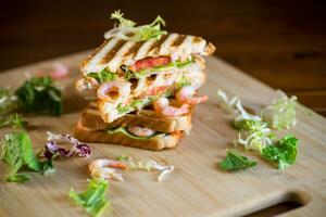 sandwich with lettuce and shrimp. photo