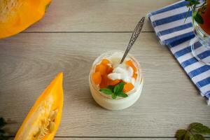 Homemade yogurt with pieces of pumpkin marmalade. photo