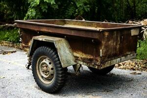 Old Abandoned Rusty Tractor Trailer. photo