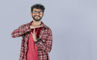 A man gesturing time out, Man doing time out gesture, latin guy doing time out gesture photo
