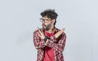 man without doing or stop sign isolated, a man crossing his arms with rejection expression, concept of man rejecting photo