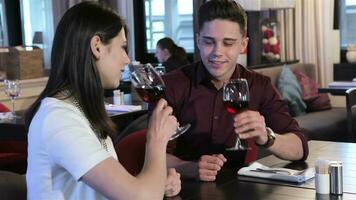 Couple drink red wine at the restaurant video
