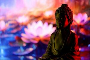 Buddha Purnima and Vesak day concept, Buddha statue with low key light against beautiful and colorful background. Meditation photo