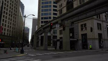 SEATTLE, USA - FEBRUARY 4, 2021 Seattle Monorail and Road in Winter Day. Car Traffic video