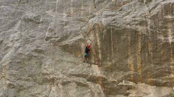 Man Climber Climbing with a Lead Rope. Crimea, Russia. Aerial View video