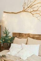 Cozy interior decorated for Christmas in Scandinavian style. Live fir trees decorated with natural ornaments made of dried oranges photo