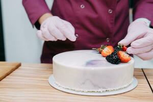 Cooking mousse cake at a cooking class. Cooking at home, home-made food. Confectioner photo