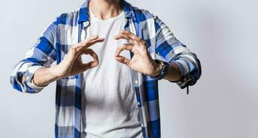 Deaf and dumb people speaking in sign language,People speaking in sign language. Person speaking in sign language isolated. Manual gestures of people with hearing problems photo