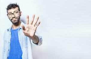Portrait of people counting number five on isolated background. Person hand counting number five. Handsome man hand showing number five, man counting number 5 photo