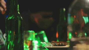 food and drink male friends are happy drinking beer and clinking glasses at a bar or pub. video