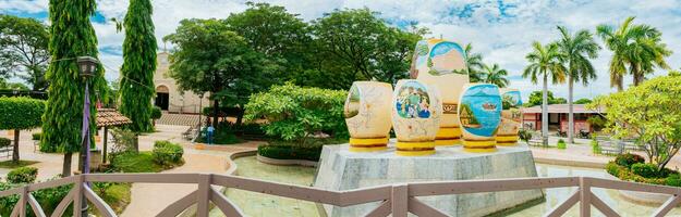 Beautiful panoramic view of the central park of Nagarote, Nicaragua. Panoramic view of a beautiful park surrounded by vegetation photo