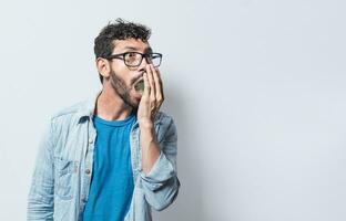 Person with bad breath problem, Concept of person with halitosis and bad breath, a guy with bad breath and halitosis problem photo