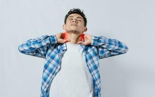 People with shoulder and neck problems, Person in pain rubbing his neck isolated, Concept of people with stress and neck pain problems. Tired guy with neck pain isolated photo