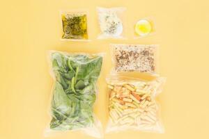 Set of products for salad preparation. Set for delivering food for dinner. Cooking at home, home cooking. Flat lay. Products in vacuum packaging. photo
