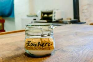 Jar with a sign that says Zucchero which means Sugar photo