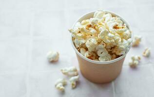 Popcorn bucket on white background photo