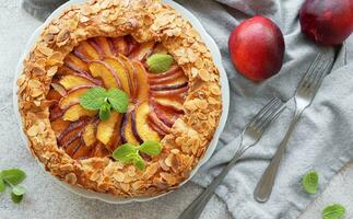 Homemade  galette with peaches. photo