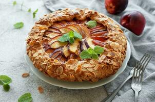 Homemade  galette with peaches. photo