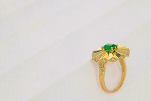 Vintage gold ring with emerald photo