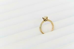 Diamond ring on white background photo