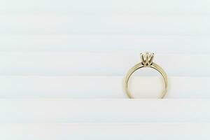 Diamond ring on white background photo