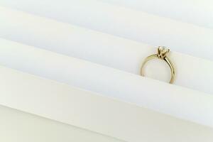 Diamond ring on white background photo