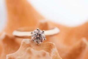 Diamond ring on seashell photo