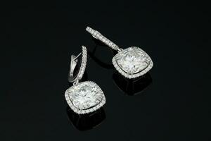 Diamond Earrings on Black Background photo