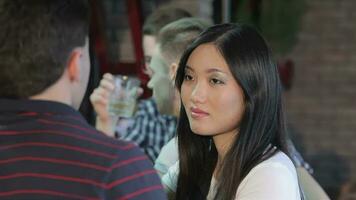 Close up of asian girl drinks wine at the bar video