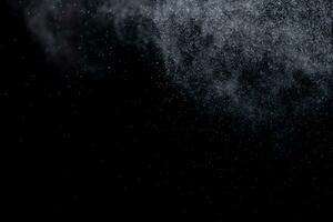 small drops of rain, snow on a black background. wind. Natural background photo