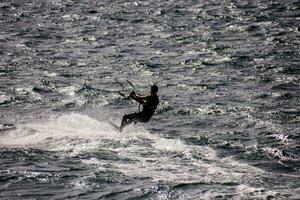 Surfing in the ocean photo