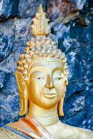 Golden Buddha statue photo